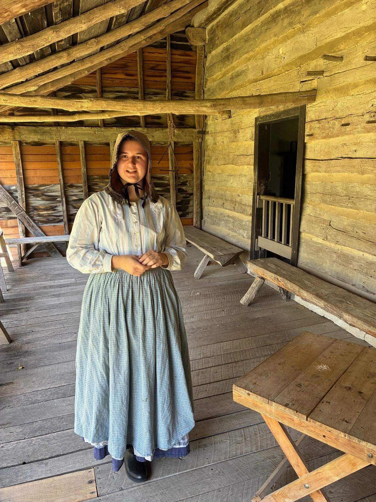 Living history interpreter Kirsten Rushing awaits visitors in the tavern/inn at Missouri Town.