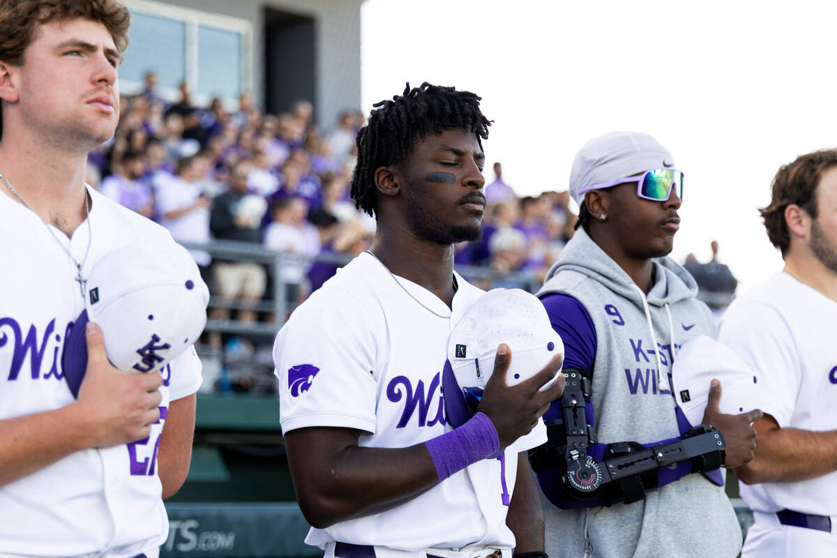 Kansas State’s Dondreone “Dee” Kennedy during the national anthem before a game against the Kansas Jayhawks in the 2026 baseball season.