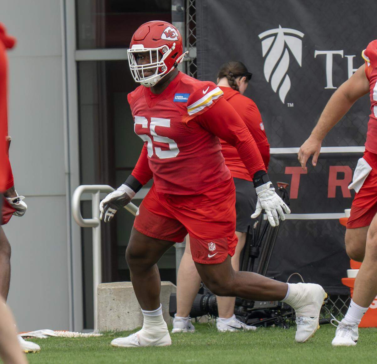 Kansas City Chiefs guard Trey Smith (65) runs a drill during practice at the Chiefs' training facility on Thursday, May 28, 2026, in Kansas City.