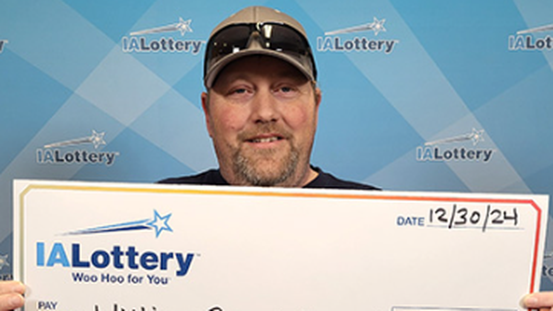 A man visiting his family for Christmas bought a ticket in his hometown and won big, Iowa lottery officials said.