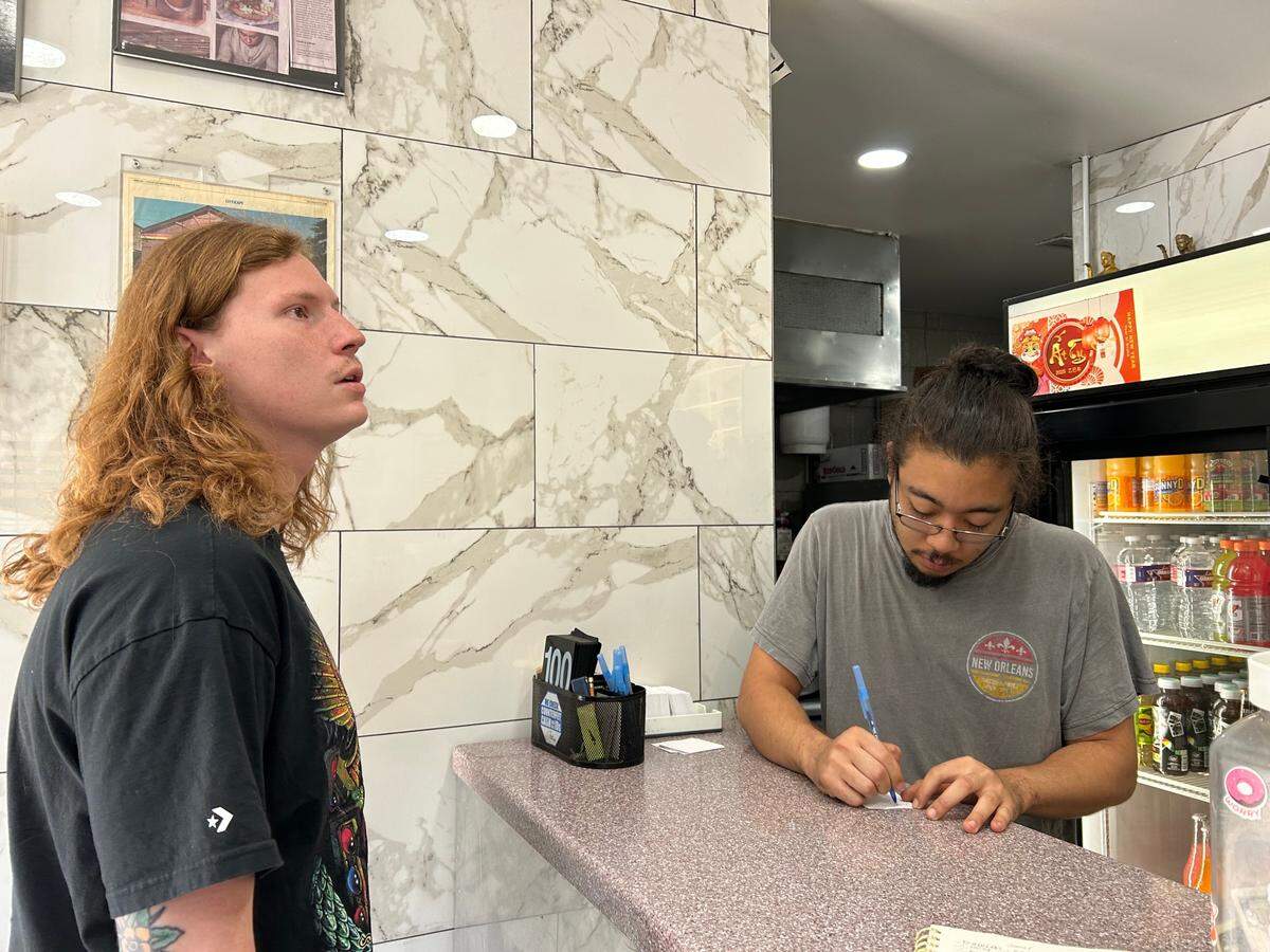 Dillon Wigfall started working at Kitty’s Cafe a decade ago when he began dating co-owner Jinna Souvilong.