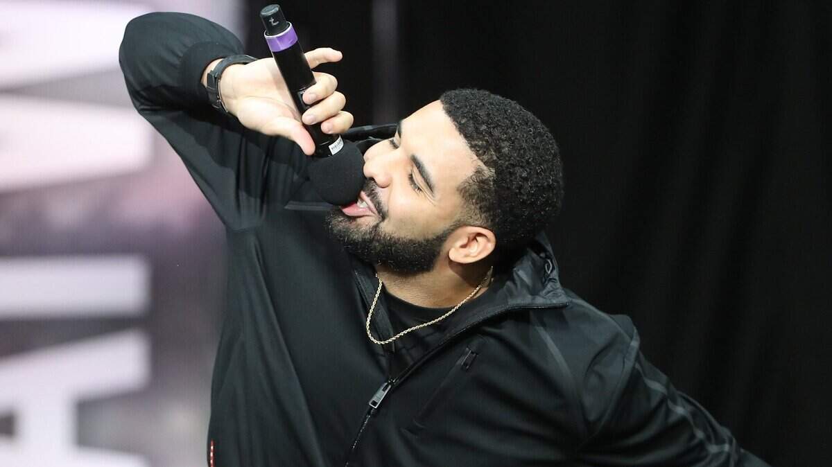 Jul 12, 2017; Toronto, Ontario, Canada; Rap artist Drake performs before Floyd Mayweather and Conor McGregor appear during a world tour press conference to promote the upcoming Mayweather vs McGregor boxing fight at Budweiser Stage. Mandatory Credit: Tom Szczerbowski-USA TODAY Sports