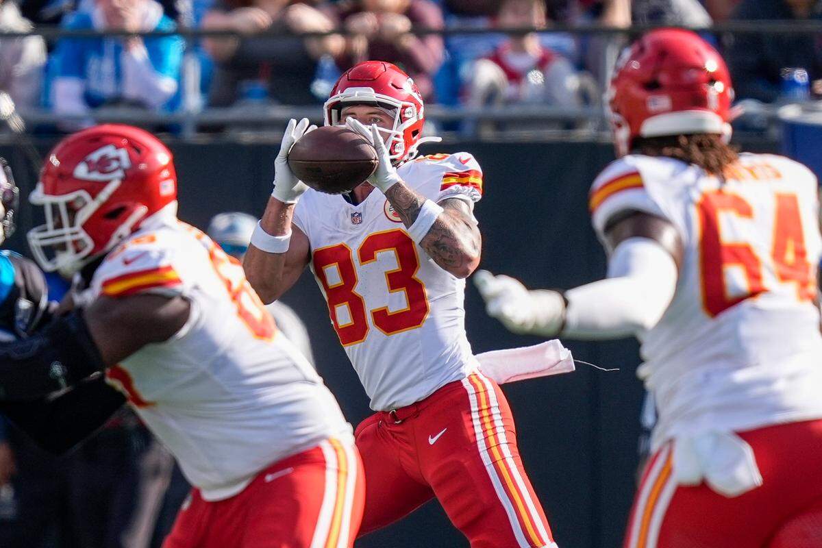 Kansas City Chiefs tight end Noah Gray (83) makes a catch from quarterback Patrick Mahomes (15) in the red zone against the Carolina Panthers during the second quarter at Bank of America Stadium.