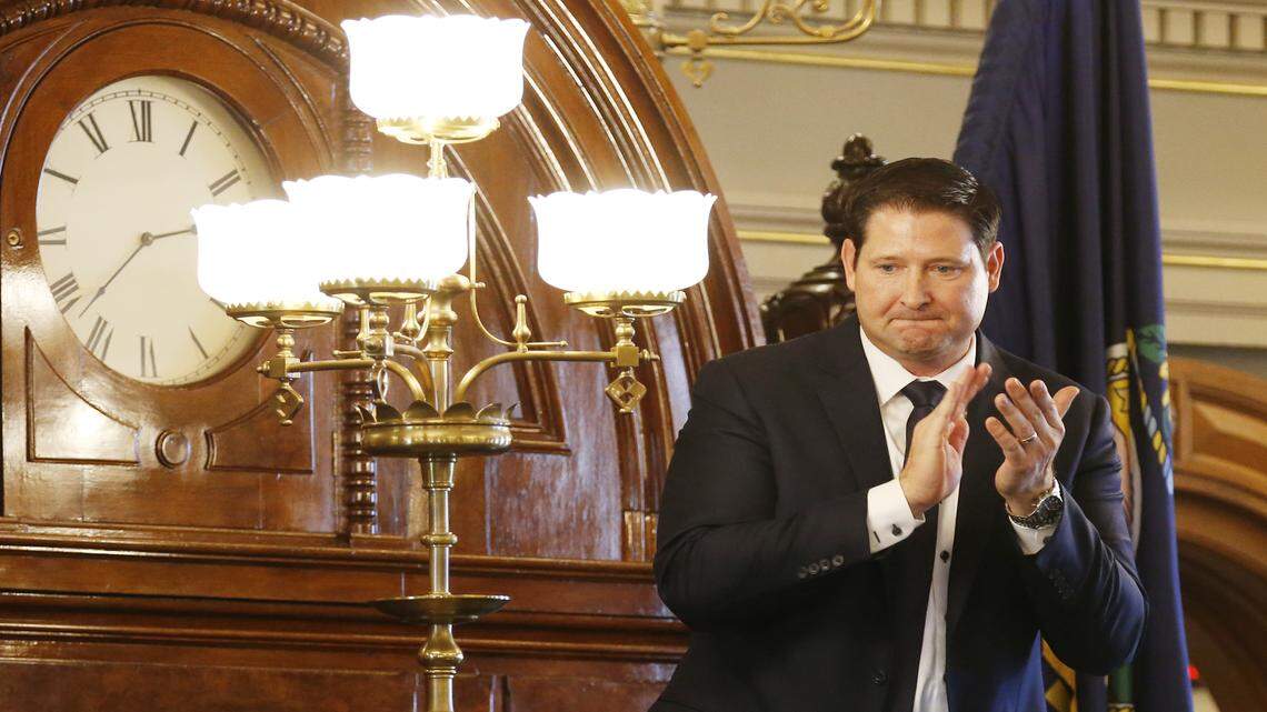 Speaker of House Ron Ryckman applauded as Rep. Scott Schwab of Olathe was announced as speaker pro tem of the Kansas House Representatives in Topeka. Schwab's 10-year-old son, Caleb, was killed in August riding the world’s tallest water slide at the Schlitterbahn water park in Kansas City, Kan.