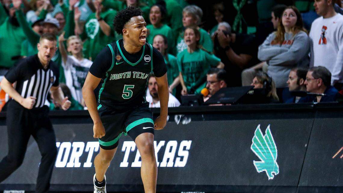 North Texas guard Tylor Perry (5) celebrates in overtime against Oklahoma State in the NIT quarterfinal round at Gallagher-Iba Arena in Stillwater, Okla., on March 21, 2023.