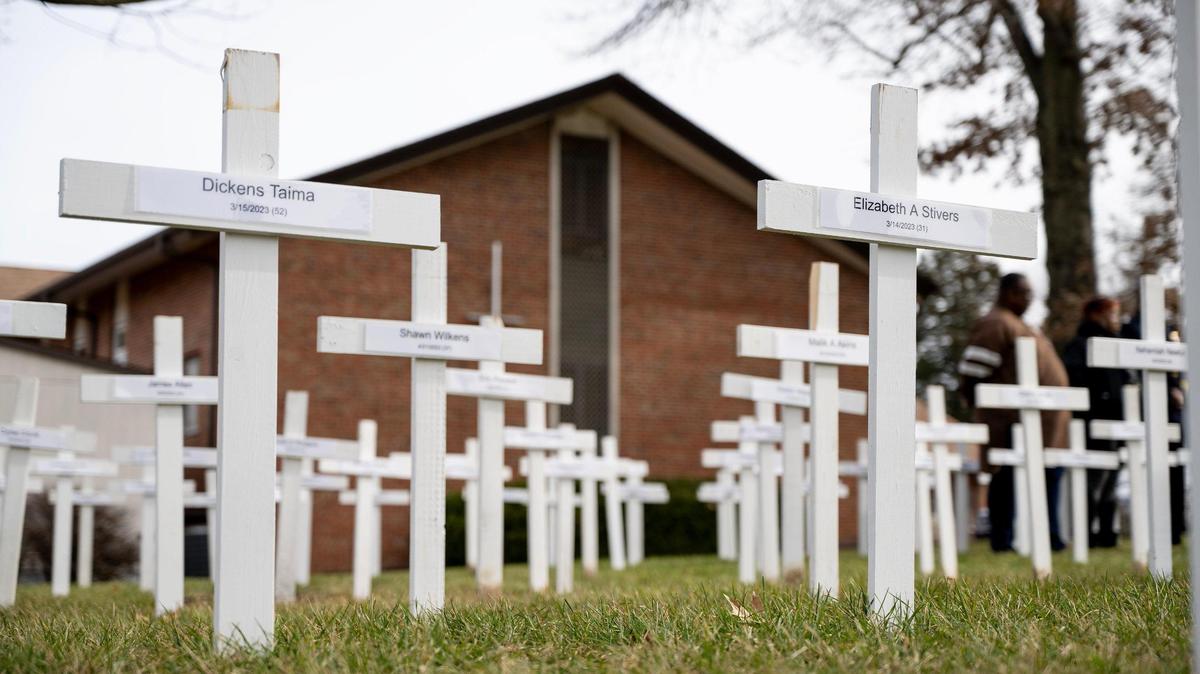 More than 170 crosses – individually marked with the names of a 2023 Kansas City homicide victim – dot the lawn outside of the Gathering Church on Wednesday, Dec. 20, 2023, in Independence, Missouri. In honor of the homicide victims, a candlelight vigil and memorial service will be held at the church Thursday night.