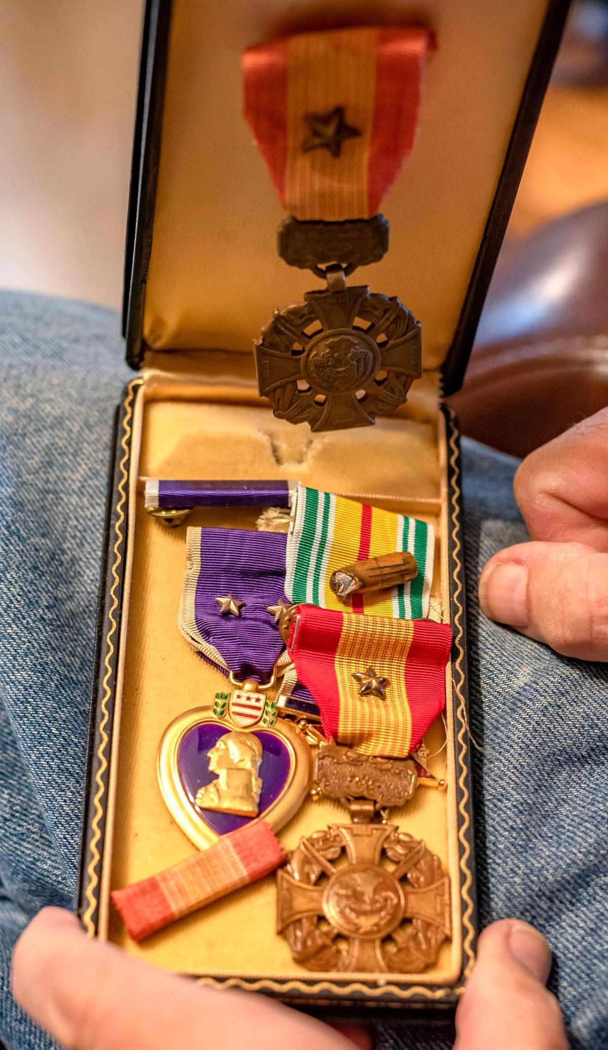 John Musgrave earned several medals for serving as a Marine in Vietnam, including two Purple Hearts.