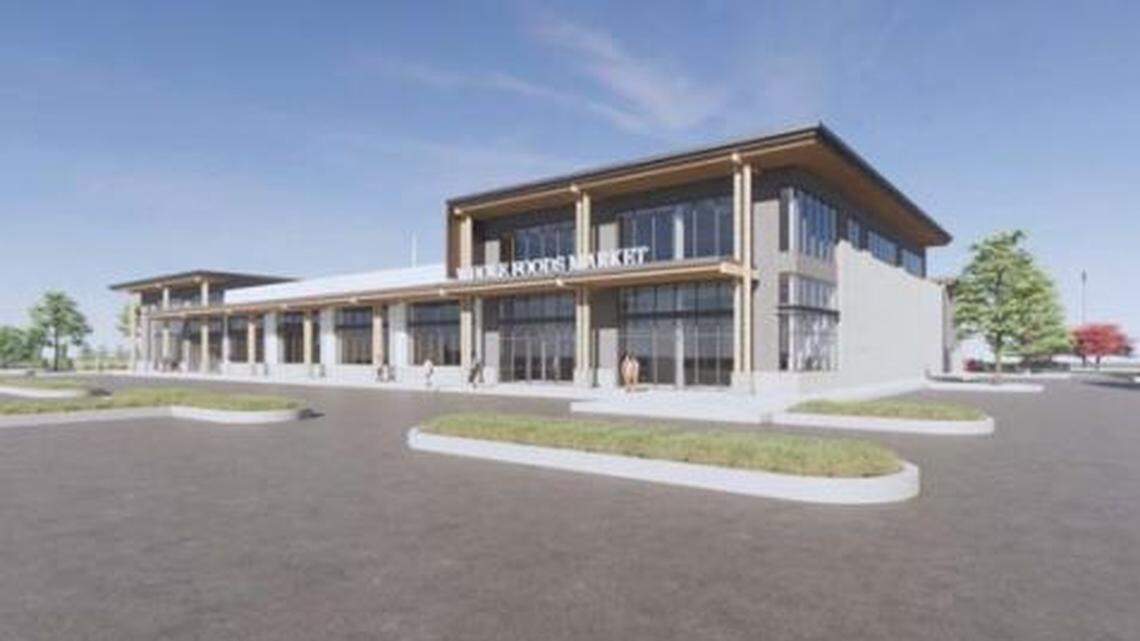 A rendering of a new Overland Crossing building shows a Whole Foods Market.