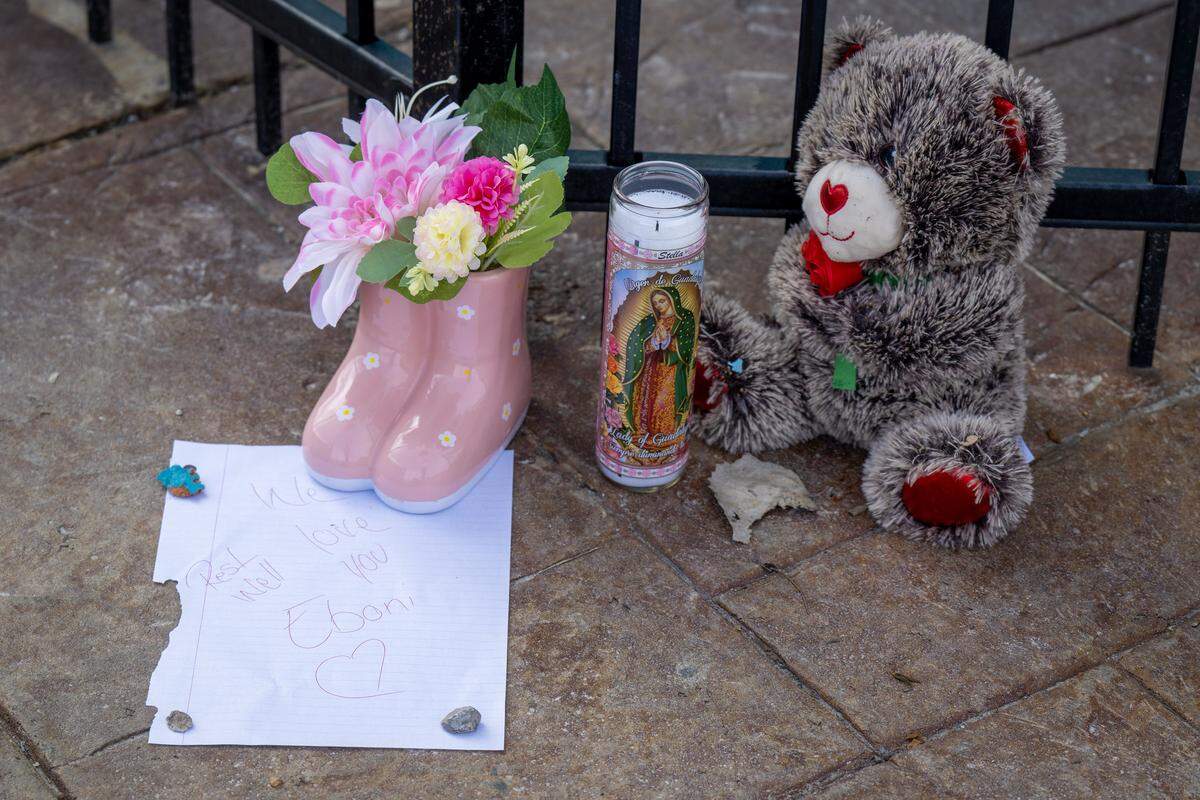 One day after a shooting left two women dead, a memorial sits outside a Kansas City nightclub at 2801 Southwest Blvd., on Monday, Feb. 16, 2026, in Kansas City. A message reads, “We love you Eboni, rest well.”