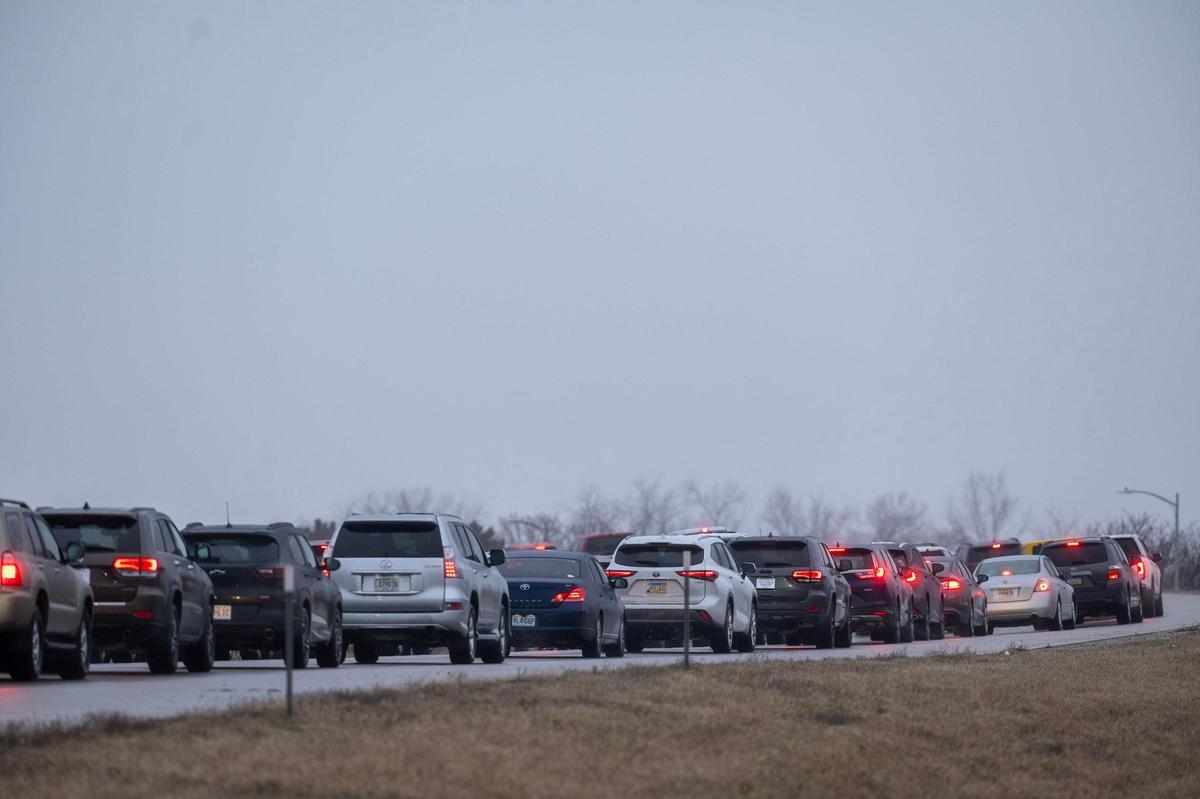 As freezing rain began to move into the area, an icy glaze slowed traffic to a crawl on southbound Interstate 35 near the U.S. 69 Highway exit Saturday, Jan. 4, 2024, in Lenexa.