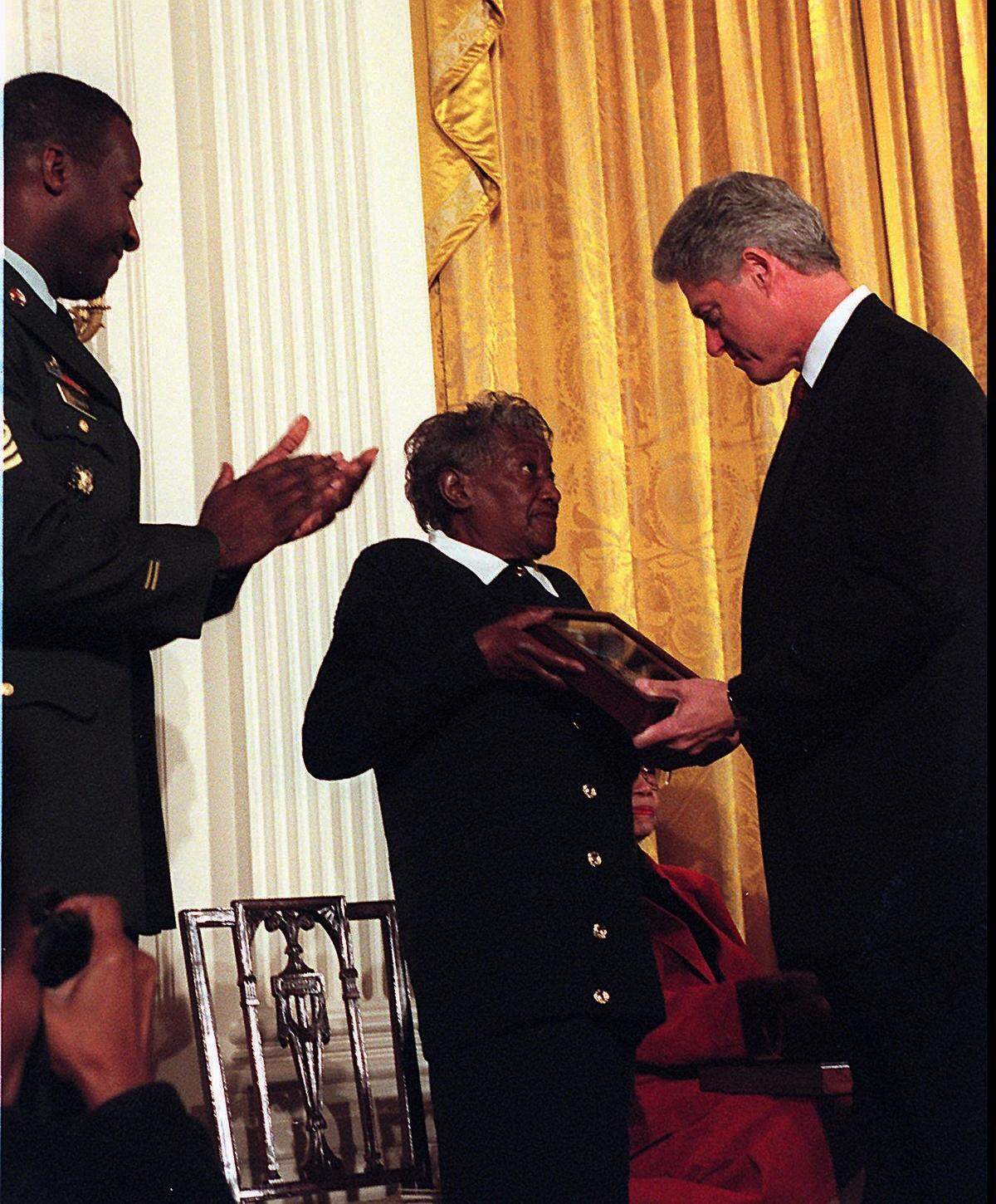 In 1997, Valcenie James, widow of Pfc. Willy F. James Jr., accepted the Medal of Honor on his behalf from President Bill Clinton.