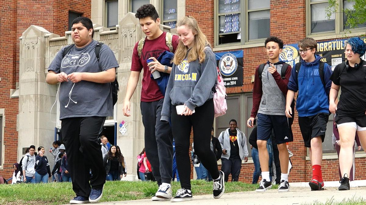 Students walk out of Lincoln College Preparatory Academy in this file photo. The Kansas City Public Schools’ magnet high school was named one of the best in the area according to education ranking website Niche.