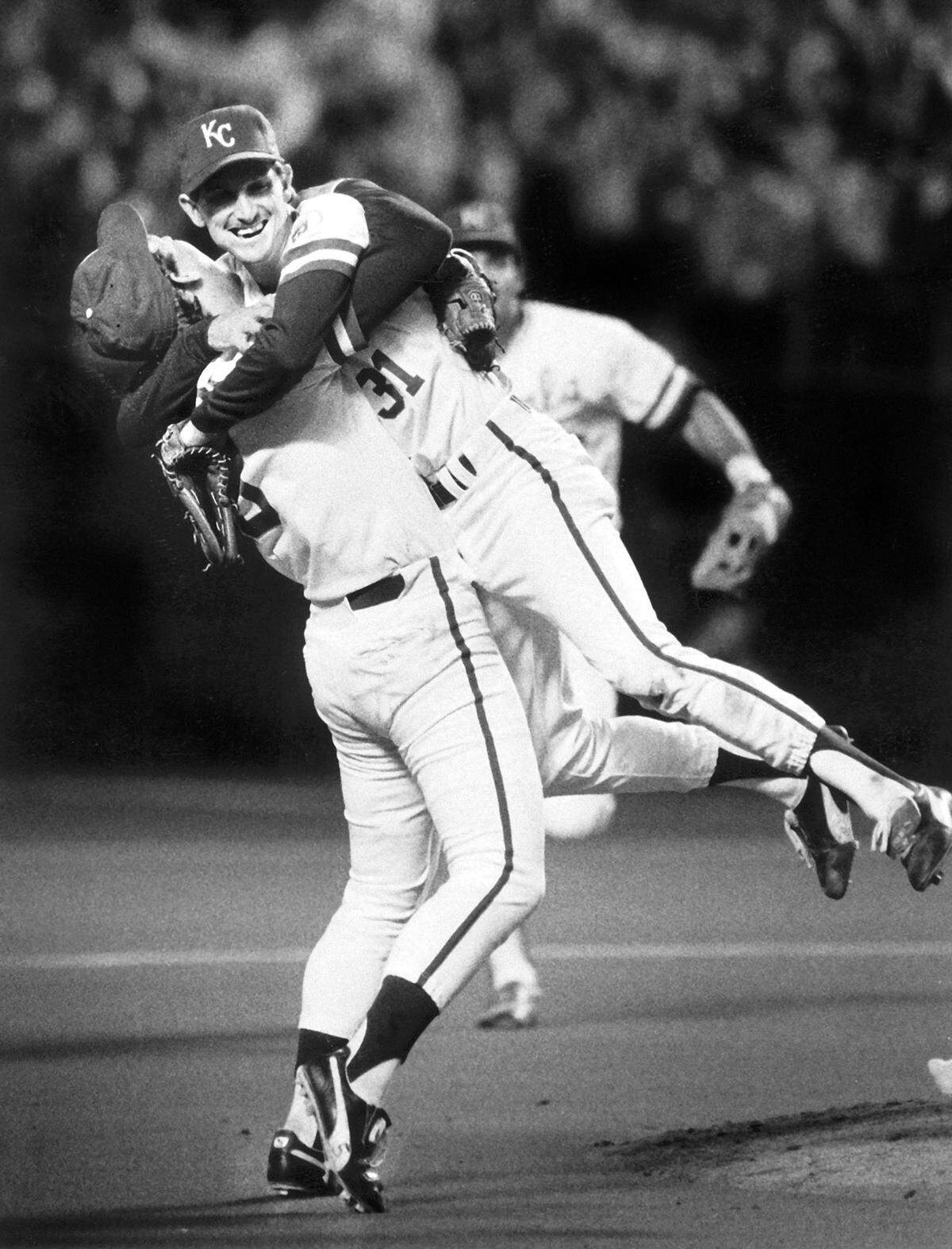 The Kansas City Royals made it all the way to the top by the end of their 17th season when the team defeated the St. Louis Cardinals to win the 1985 World Series. Having conquered the baseball world, Royals George Brett and Bret Saberhagen hugged after the final out of the Series.