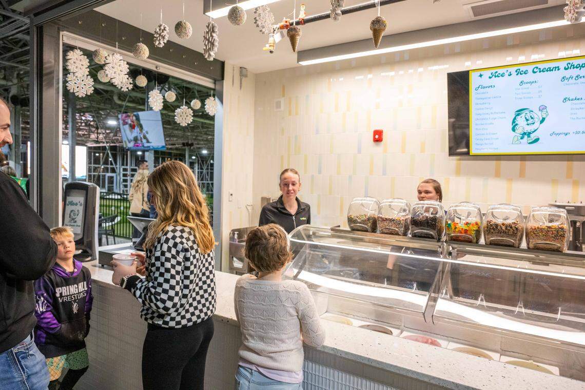 An ice cream shop just off the putting course at Tap-Ins at the Greenhouse, a new restaurant/mini golf concept in Overland Park, on Wednesday, December 3, 2025.