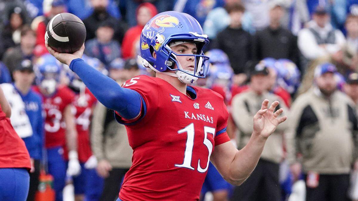 Kansas Jayhawks quarterback Cole Ballard throws a pass against the Texas Tech Red Raiders during Saturday’s game at David Booth Kansas Memorial Stadium.