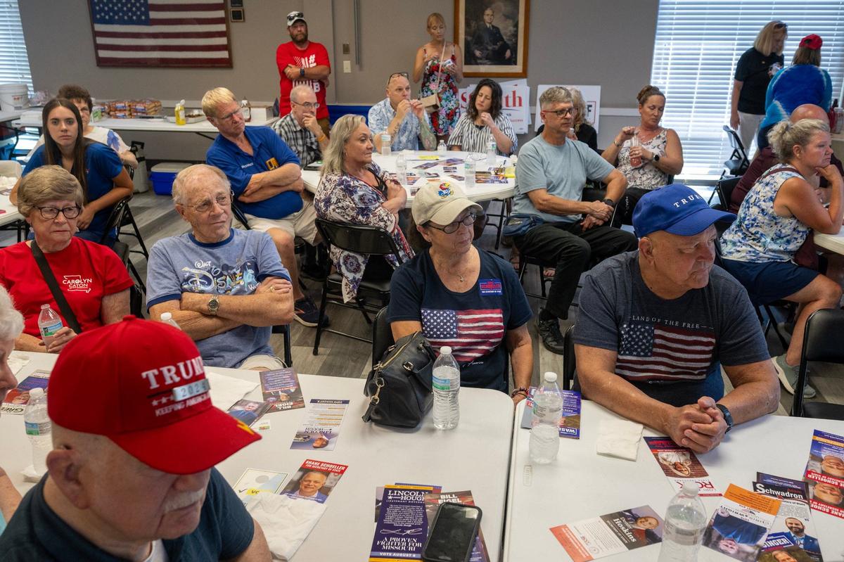Members of the Jackson County Republican Party listened as candidates spoke at an ice cream social in Kansas City on Sunday. Several candidates mentioned the attempted assassination of former President Donald Trump.