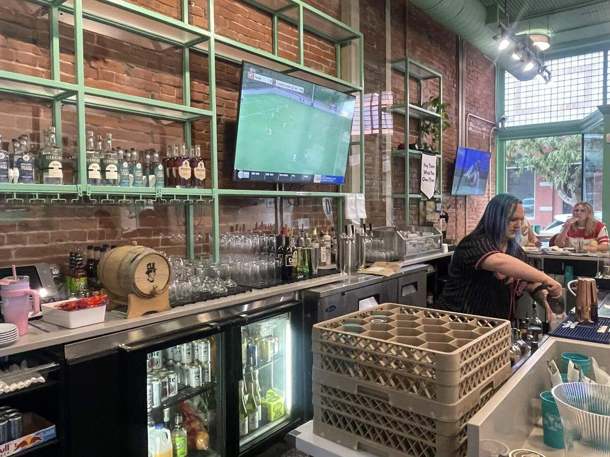The Dub shows a soccer game on its TV during a soft opening Thursday, Oct. 9.