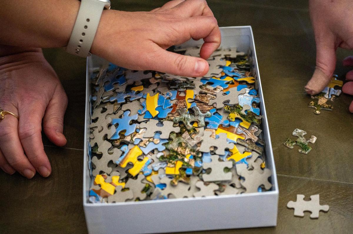 Puzzle enthusiasts gather at The Lodge at Ironwoods for the Puzzle Palooza competition in Leawood.
