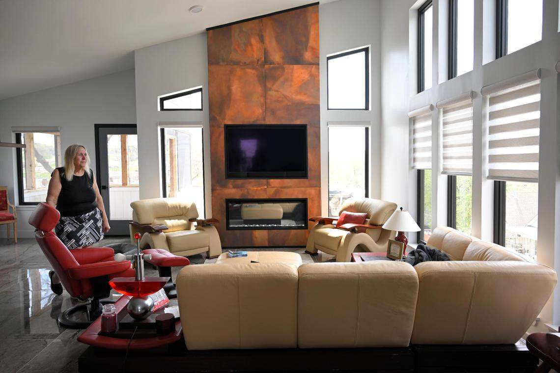 “We want to be part of the neighborhood, not change the neighborhood,” said Barb Johnson, who, after 39 years in Raytown, built a towering house that some neighbors hate among bungalows south of Avenida Cesar Chavez. Her son owns a similar house a block away.