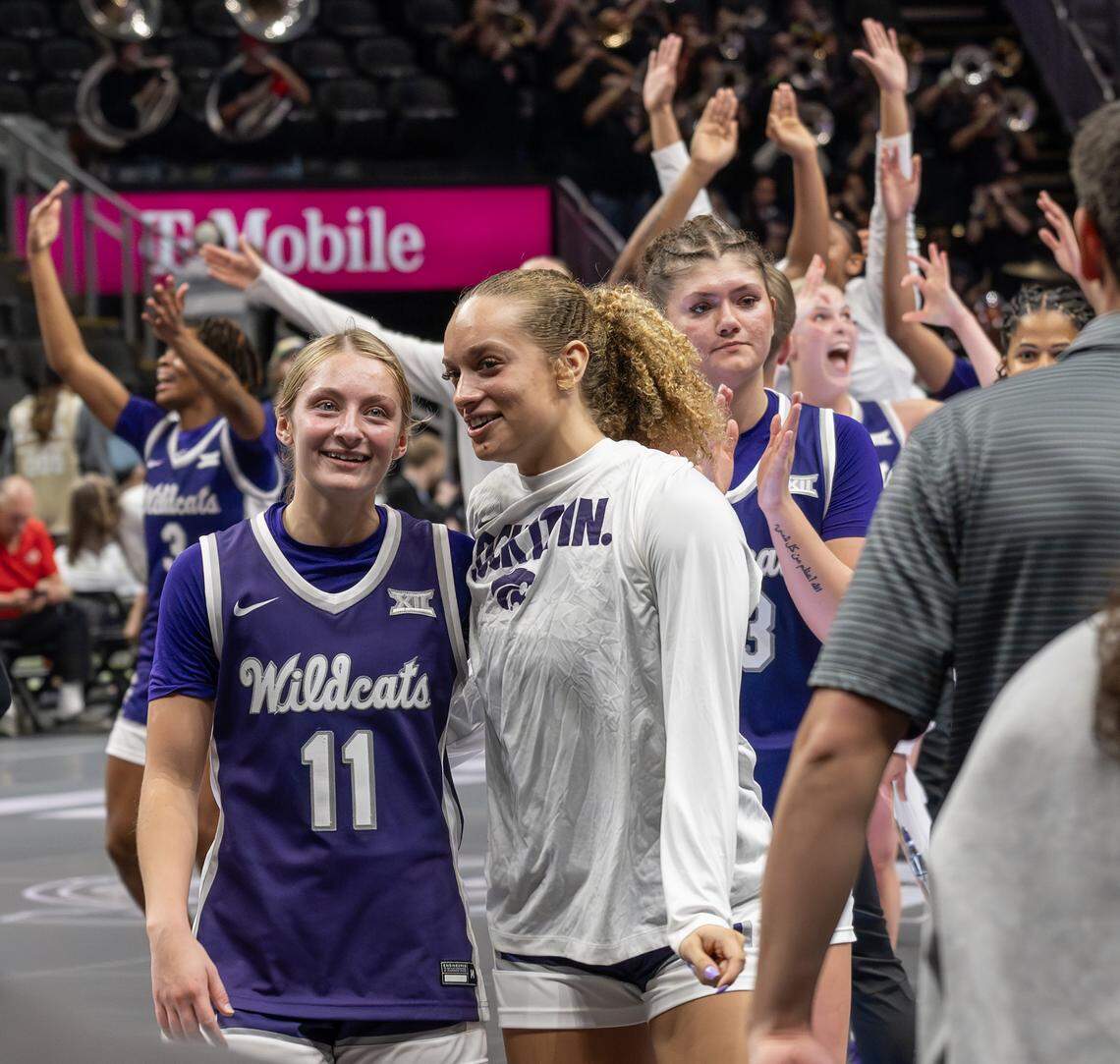 Kansas State Wildcats guards Taryn Sides (11) and Mikayla Parks (10) walk off the court after defeating the Texas Tech Red Raiders 56-51 in the Big 12 Women's Basketball Tournament at T-Mobile Center on Thursday, March 5, 2026, in Kansas City.