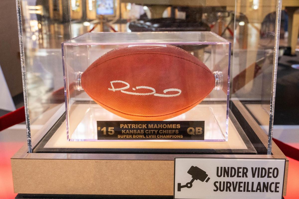 The Chiefs Fan Zone installment at Union Station has items being offered for sale in a silent auction like this Super Bowl 58 football autographed by quarterback Patrick Mahomes.