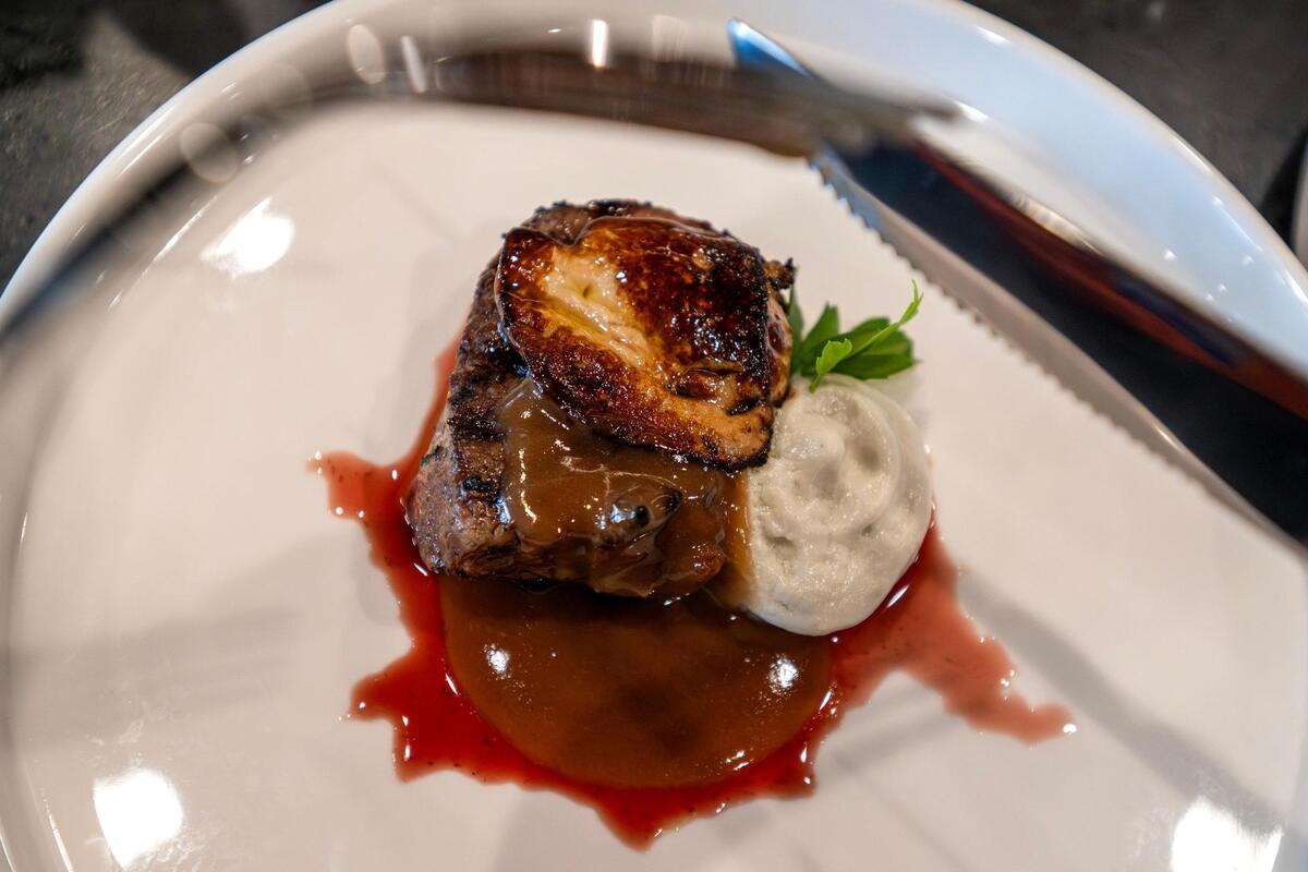 Beef tenderloin with foie gras, Cabrales blue cheese espuma, and Pedro Ximénez sherry reduction is served at Gilda’s Bar de Tapas on Thursday, July 17, 2025, in Shawnee.