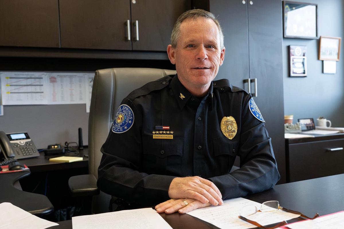 Blue Springs Police Chief Bob Muenz sits at his desk for a portrait at the Blue Springs Police Department on Tuesday, April 1, 2025.
