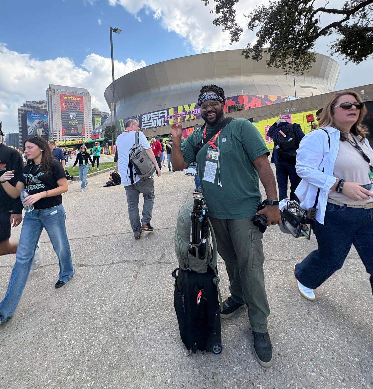 Kansas City Star visual journalist posed outside Caesars Superdome in New Orleans before covering Super Bowl LIX for The Star.