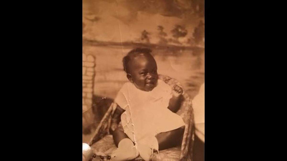Henry Miller Jr. smiles as an infant. Born in Kansas City, Kansas, he grew up with a love of singing that stayed with him for the rest of his life.