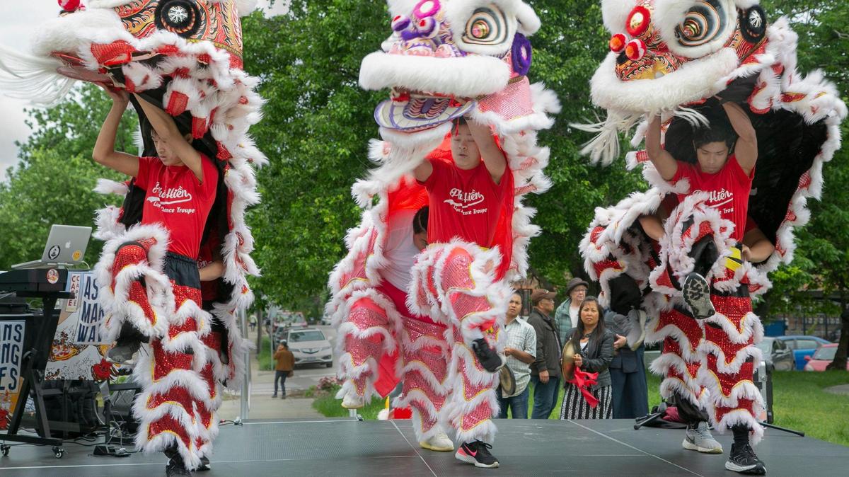 Members of the Pho Hien Lion Dance Troup performed during the Asian American and Pacific Islander Heritage month celebration Saturday, May 21, 2022 at Columbus Park in Kansas City.