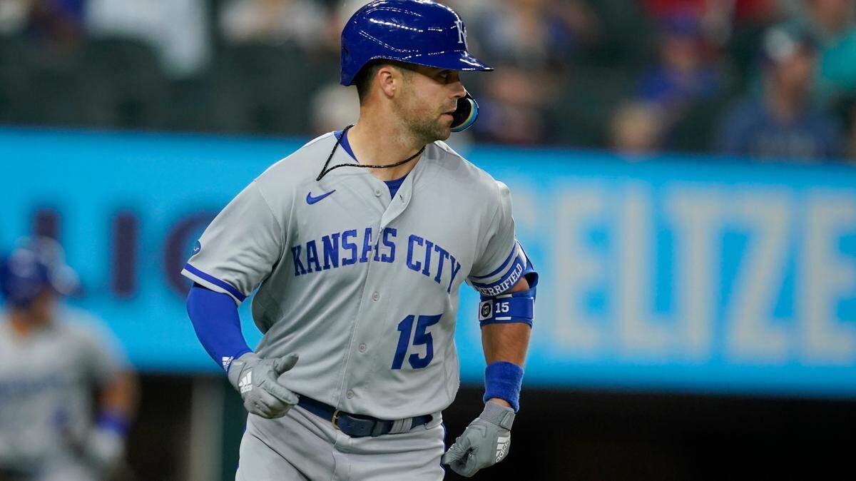 Kansas City Royals’ Whit Merrifield sprints to first after connecting for a run-scoring single in the seventh inning of a baseball game against the Texas Rangers, Tuesday, May 10, 2022, in Arlington, Texas. Emmanuel Rivera scored on the hit. (AP Photo/Tony Gutierrez)