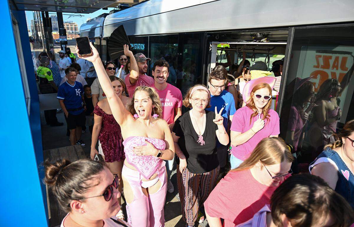 Fans file off of the KC Streetcar at the Union Station stop to head to the Chappell Roan concert on Saturday, Oct. 4, 2025, at the National WWI Museum and Memorial in Kansas City.