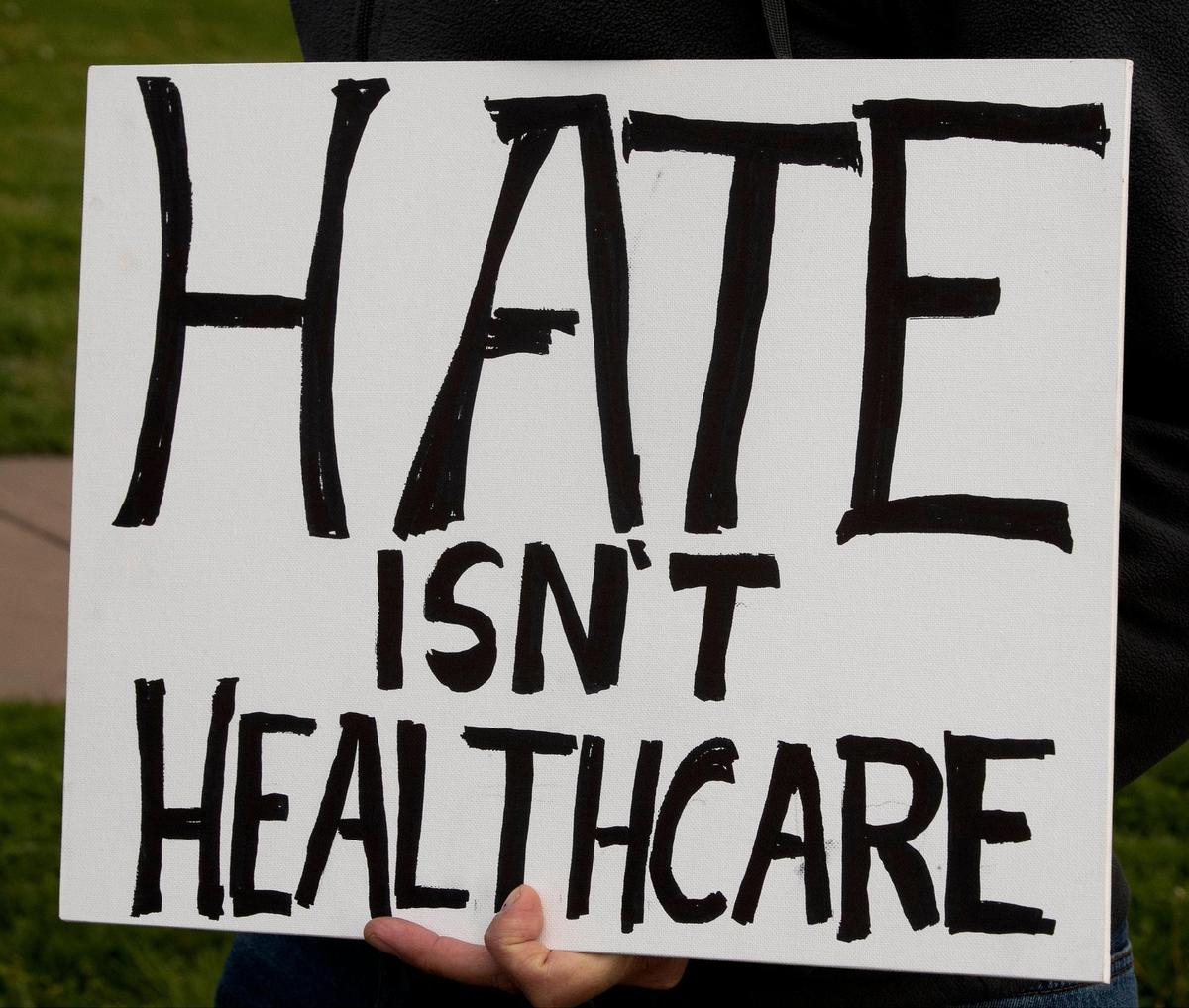 Transgender friends, family and communities gathered Sunday, April 16 at Mill Creek Park on the plaza to protest Attorney General Andrew Bailey’s new executive action so strict that it will essentially ban gender-affirming care for many adults and minors in Missouri.