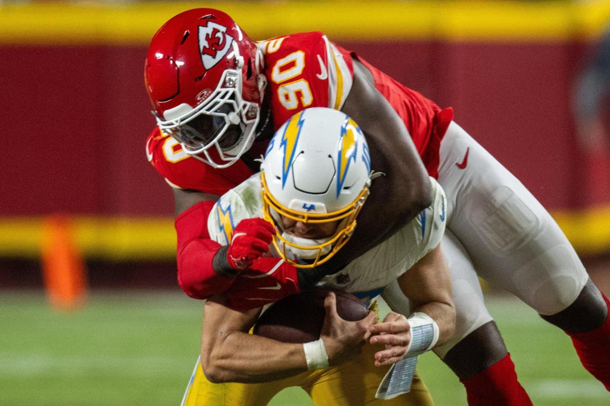 Kansas City Chiefs defensive end Charles Omenihu sacks Los Angeles Chargers quarterback Justin Herbert in the second of half of the Chiefs game vs. the Los Angeles Chargers on Sunday, Dec. 8, 2024 at GEHA Field at Arrowhead Stadium.