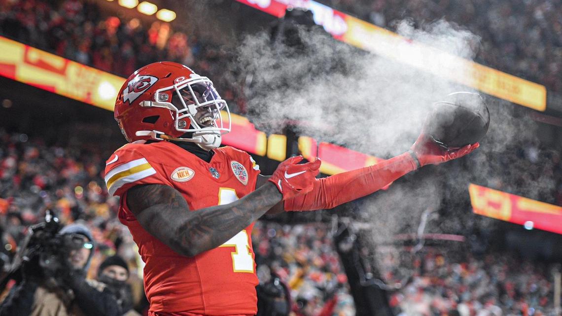 Kansas City Chiefs wide receiver Rashee Rice (4) celebrates after scoring a touchdown agains the Miami Dolphins in the first quarter Saturday, Jan. 13, 2024, at GEHA Field at Arrowhead Stadium.