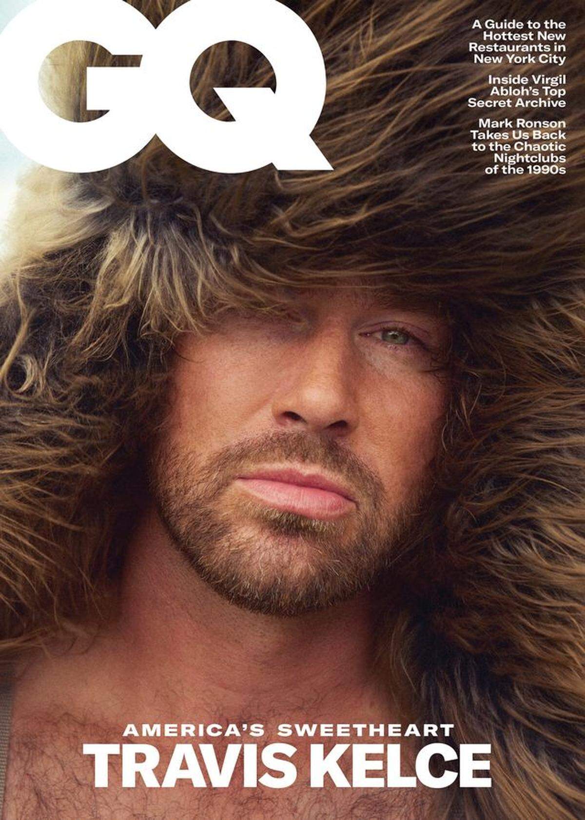 One of the Travis Kelce photos shows him in a furry Etro hat.