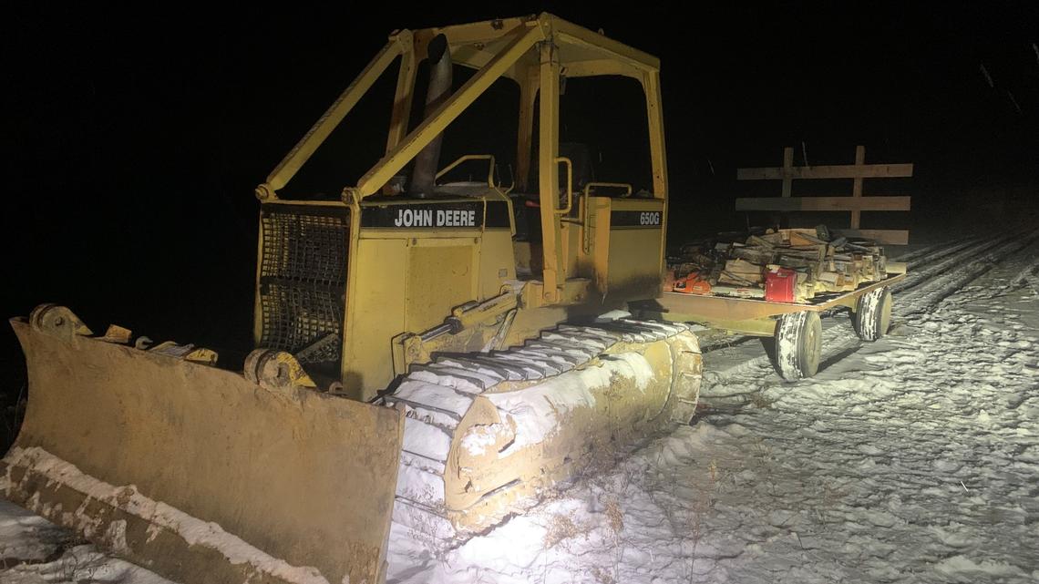 A 7-year-old boy was killed when he fell from a trailer and was run over by a bulldozer, police say.