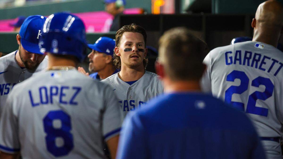 Kansas City Royals shortstop Bobby Witt Jr. (7) celebrates with teammates after scoring during the eighth inning against the Texas Rangers at Globe Life Field on April 11, 2023