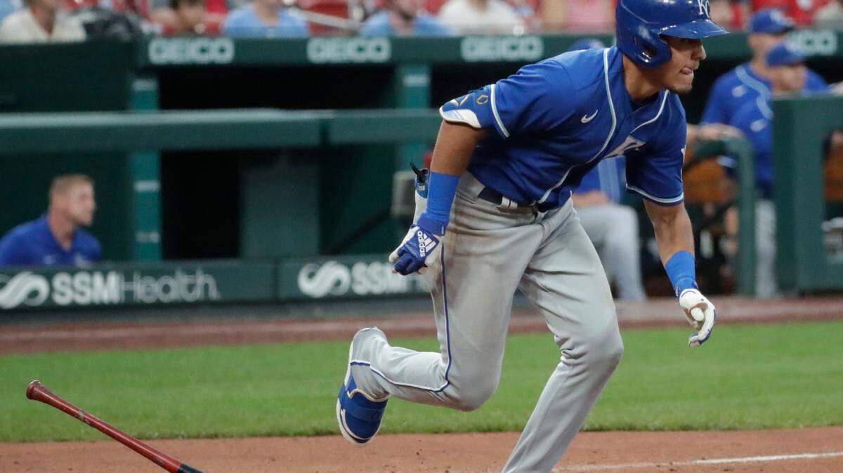 Kansas City Royals’ Nicky Lopez (8) watches his RBI-single in the ninth inning of a baseball game against the the St. Louis Cardinals, Sunday, Aug. 8, 2021, in St. Louis. (AP Photo/Tom Gannam)