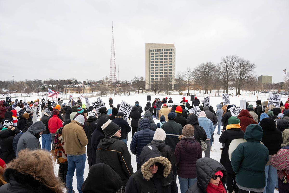 Protesters gathered at the World War I Museum and Memorial to rally against recent ICE actions across the U.S. and in Kansas City on Friday, January 30, 2026.