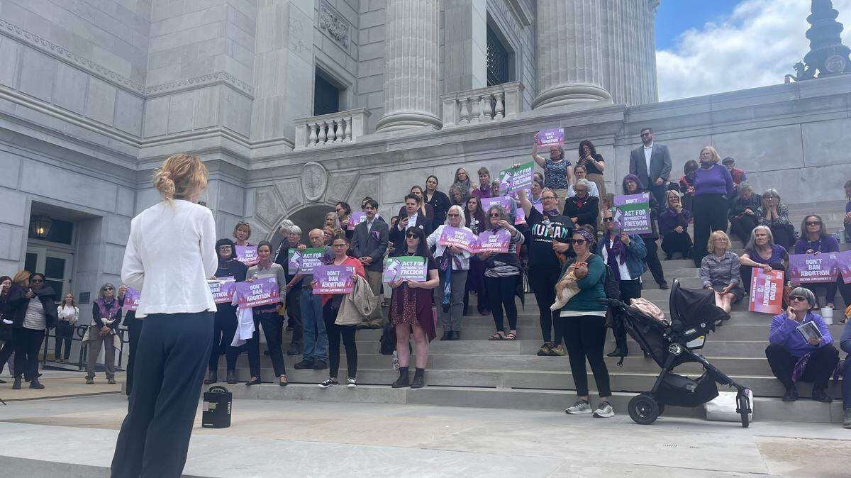 On the steps on the Missouri Capitol, a crowd of abortion rights supporters protest legislation on Wednesday, April 30, 2025, that would enact a new abortion ban in Missouri.