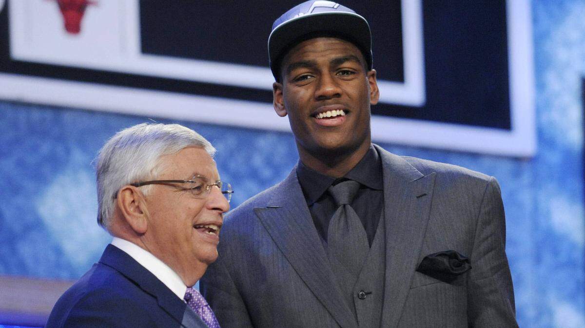 Then-NBA commissioner David Stern, left, poses with Alec Burks on draft night 2011.