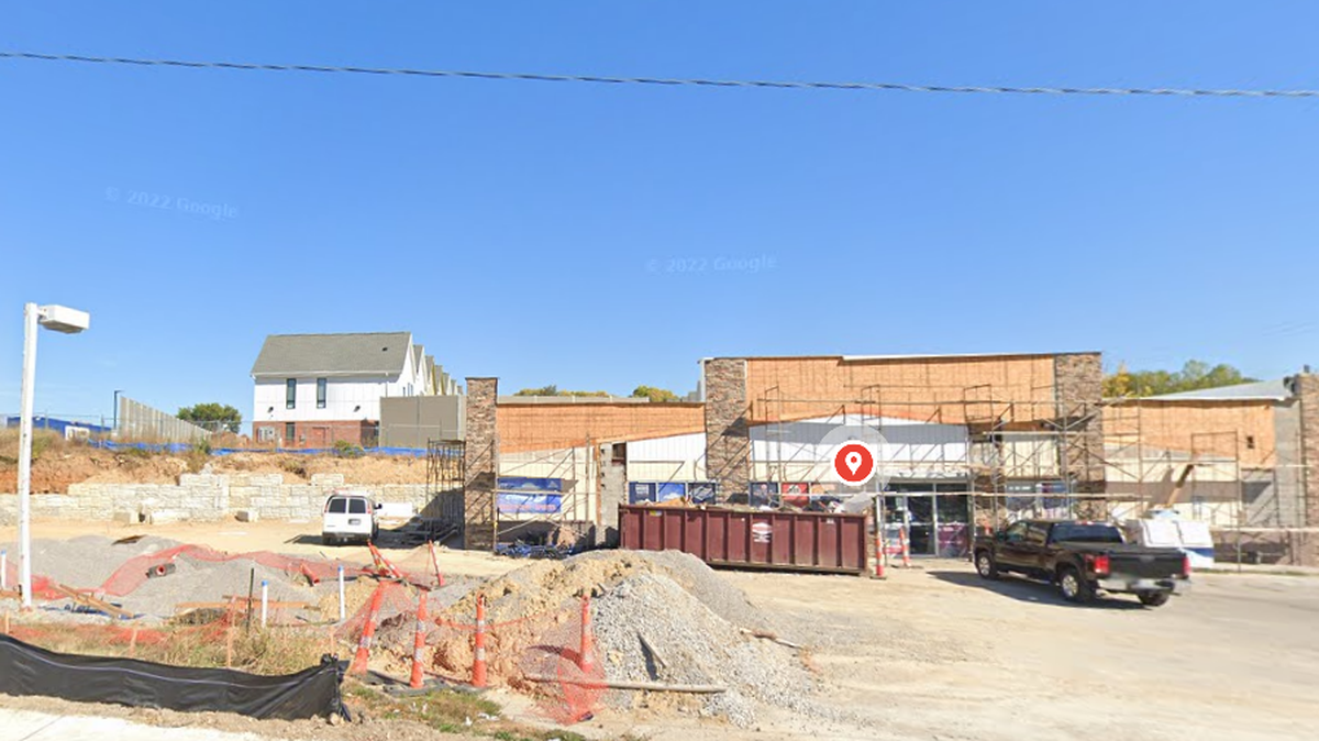 Police have detained a subject of interest after a person died overnight Tuesday at the Discount Smokes & Liquor at 4305 Northeast Antioch Road. This Google Maps Street View image shows the area in October 2022.