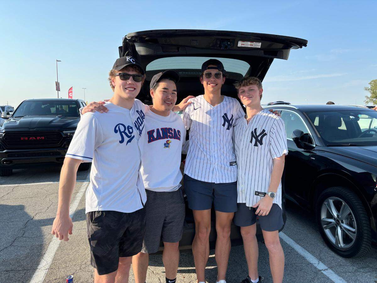 University of Kansas students drove up from Lawrence to see the game, including, from left to right, Micah Broekhuizen, Noah Anderson, Rayce Haden and Logan Barbarino.