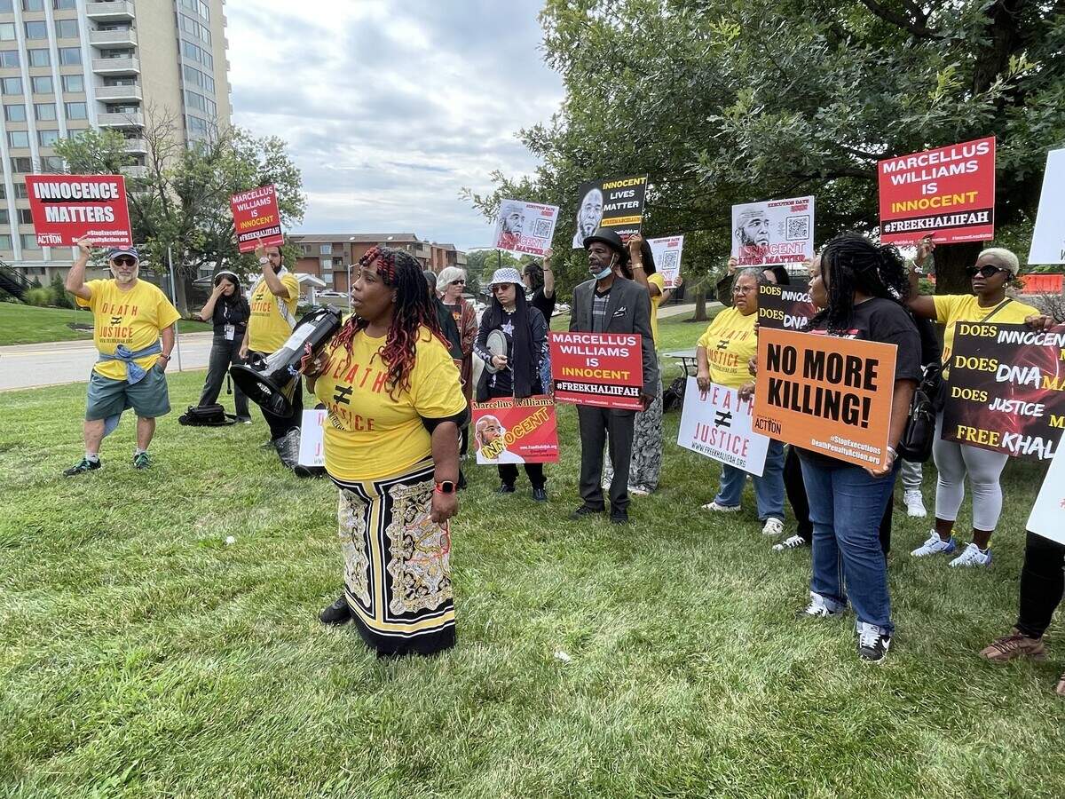 Michelle Smith with Missourians to Abolish the Death Penalty speaks at a demonstration Wednesday in St. Louis County to oppose Marcellus Williams’ scheduled execution.