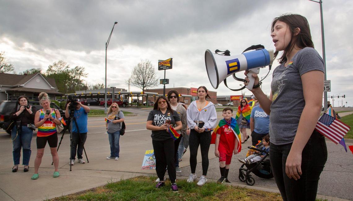 Grain Valley high school senior and student body president, Mia Powell addresses those gathered at a rally to support LGBTQ students in the school district Friday, April 29, 2022.