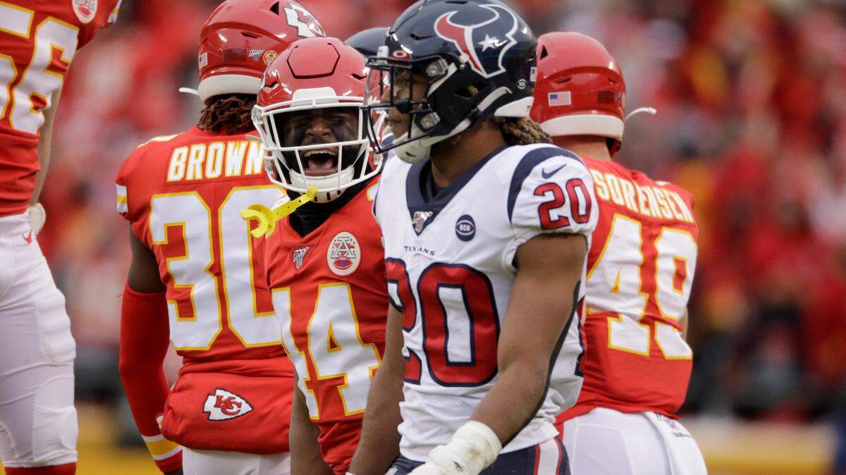 Kansas City Chiefs linebacker Dorian O’Daniel (44) and linebacker Ben Niemann (56) react next to Houston Texans safety Justin Reid (20) after a failed fourth down attempt by the Texans, in the first half of an NFL divisional playoff football game, in Kansas City, Mo., Sunday, Jan. 12, 2020. (AP Photo/Charlie Riedel)