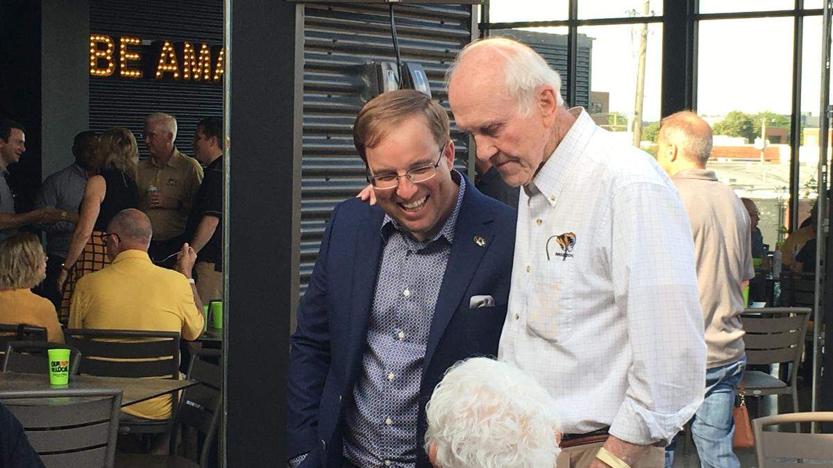Missouri football coach Eli Drinkwitz with Phil Snowden, who quarterbacked the Tigers to national prominence in the late 1950s, at the Tiger Takeover at Chicken N Pickle in North Kansas City on Tuesday, May 18, 2021