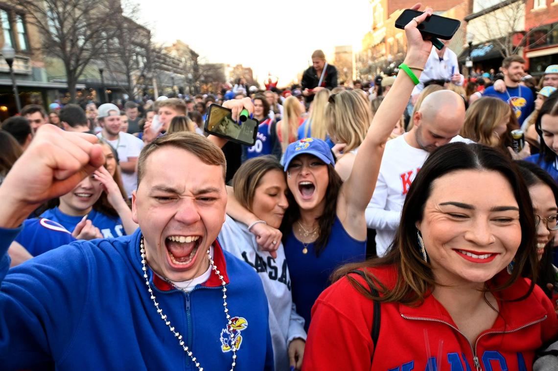 Jayhawk fans celebrated on Massachusetts street in Lawrence after the Jayhawks defeated Villanova on Saturday, April 2, 2022 to advance to the NCAA National Championship on Monday in New Orleans.