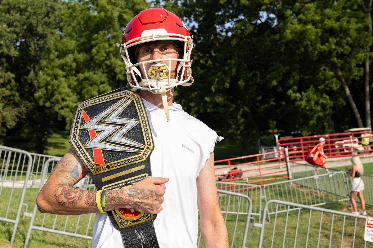 Diehard Chiefs fan Matt Courtin with his lucky WWE Championship belt at training camp in St. Joseph. Courtin, a native of St. Joseph, has been attending the Chiefs’ training camp since 2016.
